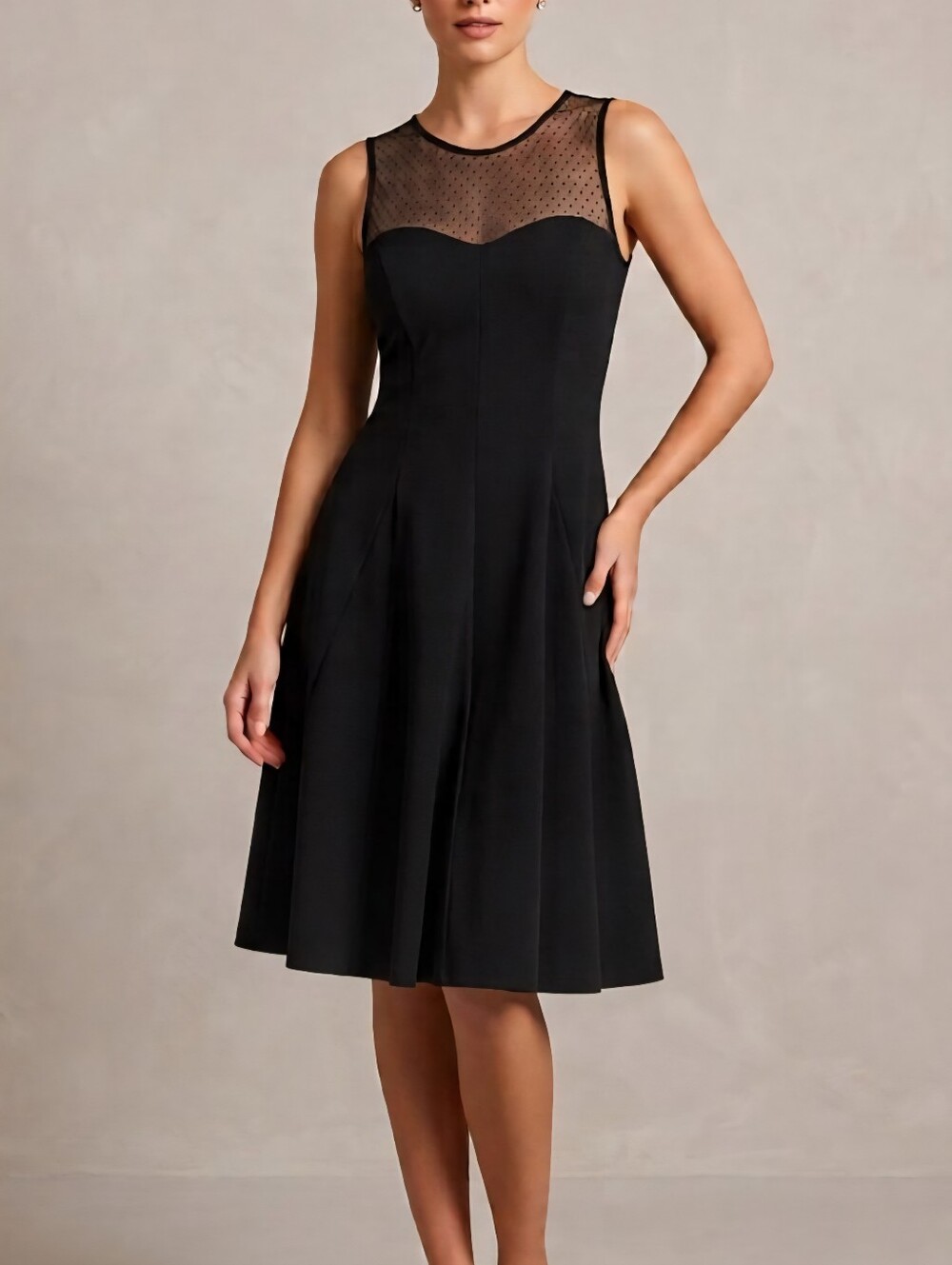 Classic Little Black Sleeveless Fit-and-Flare Dress with Sheer Polka Dot Yoke